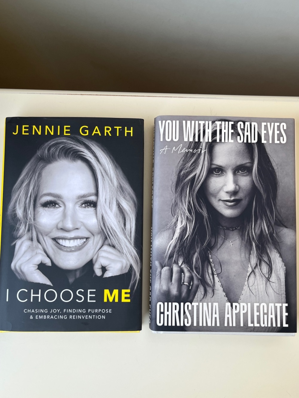 Two hardbound books: Jennie Garth and Christina Applegate